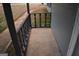 Cozy covered porch with neutral-colored concrete flooring, wood posts and railing at 3281 Nina Way, Douglasville, GA 30135
