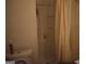 A well-lit shower area with white walls and curtain is featured at 3281 Nina Way, Douglasville, GA 30135
