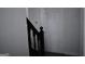 A staircase with dark wooden railing is pictured at 3281 Nina Way, Douglasville, GA 30135