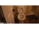 A bathroom with a classic white toilet and simple design at 3281 Nina Way, Douglasville, GA 30135