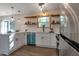 Modern kitchen with stainless appliances, white countertops, and a bright blue dishwasher at 1974 Young Rd, Lithonia, GA 30058