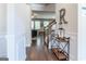 Inviting foyer showcasing hardwood floors, staircase, and decorative accents, creating a warm welcome at 113 Maplewood Ln # 176, Conyers, GA 30094