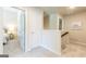 Hallway showcases a view into the bedroom and stairs at 113 Maplewood Ln # 176, Conyers, GA 30094
