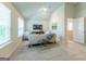 Carpeted loft featuring a vaulted ceiling, media center and lots of natural light at 113 Maplewood Ln # 176, Conyers, GA 30094