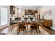 Dining area with table, chairs, and view of the kitchen featuring an open floorplan at 113 Maplewood Ln # 176, Conyers, GA 30094