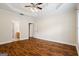 Spacious main bedroom features hardwood floors and a tray ceiling at 243 Long Dr, Mcdonough, GA 30253
