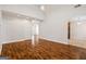 Open concept living room featuring hardwood floors and high ceilings at 243 Long Dr, Mcdonough, GA 30253