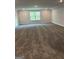 View of bedroom with carpeted flooring, a window that lets in natural light, and light gray walls at 3382 Milan Ct # 3 Plapprox Sqft 3, Douglasville, GA 30135