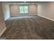 View of bedroom with carpeted flooring, a window that lets in natural light, and light gray walls at 3382 Milan Ct # 3 Plapprox Sqft 3, Douglasville, GA 30135