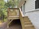 A multi-level wooden deck with steps offers an inviting transition to the landscape at 3382 Milan Ct # 3 Plapprox Sqft 3, Douglasville, GA 30135