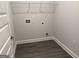 Laundry room featuring hookups and shelving with gray walls and dark gray flooring at 3382 Milan Ct # 3 Plapprox Sqft 3, Douglasville, GA 30135