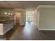 This open floor plan living room has a kitchen, pantry, and front entrance view at 3382 Milan Ct # 3 Plapprox Sqft 3, Douglasville, GA 30135
