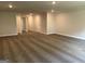 Open living room with gray walls and carpeting, and a walk-in closet featuring doors at 3382 Milan Ct # 3 Plapprox Sqft 3, Douglasville, GA 30135