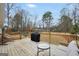 Spacious deck features outdoor seating, a grill, and a view of the backyard at 20 Manor Oak Ln, Covington, GA 30014