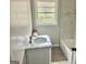 Bathroom featuring a new vanity with marble top, tiled floor, and tub at 2037 Mesa Se Dr, Atlanta, GA 30316