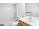 Bathroom featuring white shower, toilet and vanity at 153 Cedar Ridge Rd, Locust Grove, GA 30248