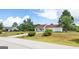Charming home with a spacious front lawn and long driveway at 153 Cedar Ridge Rd, Locust Grove, GA 30248