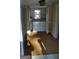 Well-lit laundry room featuring modern appliances and neutral walls at 2421 Rockbridge Sw Rd, Stone Mountain, GA 30087
