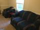 Living room area showcasing comfortable seating and a view at 2421 Rockbridge Sw Rd, Stone Mountain, GA 30087
