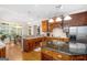 Kitchen with island and eat in breakfast nook filled with natural light at 101 Kenmare Row, Tyrone, GA 30290