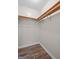 This is a walk-in closet with shelving and wood-look flooring at 3645 Fay Dr, Rex, GA 30273