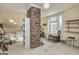 Bright, airy bedroom with a unique brick accent wall and large windows at 86 Victoria Dr, Moreland, GA 30259