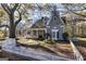 Charming two-story home featuring unique architecture and a inviting front porch at 86 Victoria Dr, Moreland, GA 30259