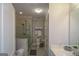 Well-lit bathroom features a glass enclosed shower and modern fixtures at 6422 Paulson, Atlanta, GA 30328