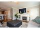 Cozy living room with fireplace, hardwood floors, and neutral decor at 6422 Paulson, Atlanta, GA 30328