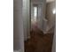 Hallway with plush carpeting, multiple doorways, and natural light, creating a welcoming atmosphere at 2941 Vining Ridge Ter, Decatur, GA 30034