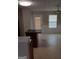 Bright kitchen features linoleum floors, black appliances, and counter island for meal prep at 2941 Vining Ridge Ter, Decatur, GA 30034