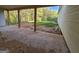 The covered back patio offers a view of the wooded backyard, perfect for enjoying the outdoors at Lot C Montannas Way, Moreland, GA 30259