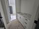 Bathroom vanity with marble countertop and plenty of storage at Lot C Montannas Way, Moreland, GA 30259