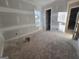 Bright bedroom featuring neutral walls and trim, offering a versatile space ready for personalization at Lot C Montannas Way, Moreland, GA 30259