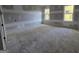 Unfinished bedroom with drywall, natural light from two windows at Lot C Montannas Way, Moreland, GA 30259