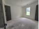 Spacious bedroom featuring a large window for natural light at Lot C Montannas Way, Moreland, GA 30259
