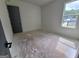 Bright bedroom with large window and stylish gray door at Lot C Montannas Way, Moreland, GA 30259