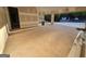 Large unfinished garage with open framing and a view to the backyard at Lot C Montannas Way, Moreland, GA 30259