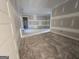 Open-concept living room features neutral walls, ideal for creating a seamless flow throughout the home at Lot C Montannas Way, Moreland, GA 30259