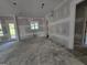 Unfinished living room with large windows offering natural light at Lot C Montannas Way, Moreland, GA 30259