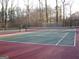 Well-maintained community tennis courts surrounded by trees at 3083 Colonial Way # N, Atlanta, GA 30341