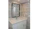 Modern bathroom featuring a sleek vanity and a large mirror at 3083 Colonial Way # N, Atlanta, GA 30341