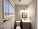 This bathroom features a modern vanity, toilet and nice mirror at 3403 Dodson Ter, East Point, GA 30344