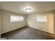 This bedroom features carpet and neutral paint, providing a serene space at 3403 Dodson Ter, East Point, GA 30344