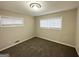 This bedroom features carpet and neutral paint, providing a serene space at 3403 Dodson Ter, East Point, GA 30344