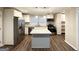 Modern kitchen featuring stainless steel appliances, granite countertops, kitchen island, and ample storage at 3403 Dodson Ter, East Point, GA 30344