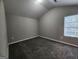 Neutral bedroom with large window for plenty of natural light at 5725 Cedar Pass, Fairburn, GA 30213
