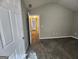 Bedroom with neutral walls, carpet floors, and an open door to the hallway at 5725 Cedar Pass, Fairburn, GA 30213