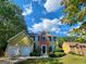 Charming two-story home with an attached two-car garage is nestled in a beautiful residential neighborhood at 5725 Cedar Pass, Fairburn, GA 30213