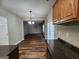 Spacious kitchen with wood cabinets, granite countertops, and views of the breakfast nook at 5725 Cedar Pass, Fairburn, GA 30213